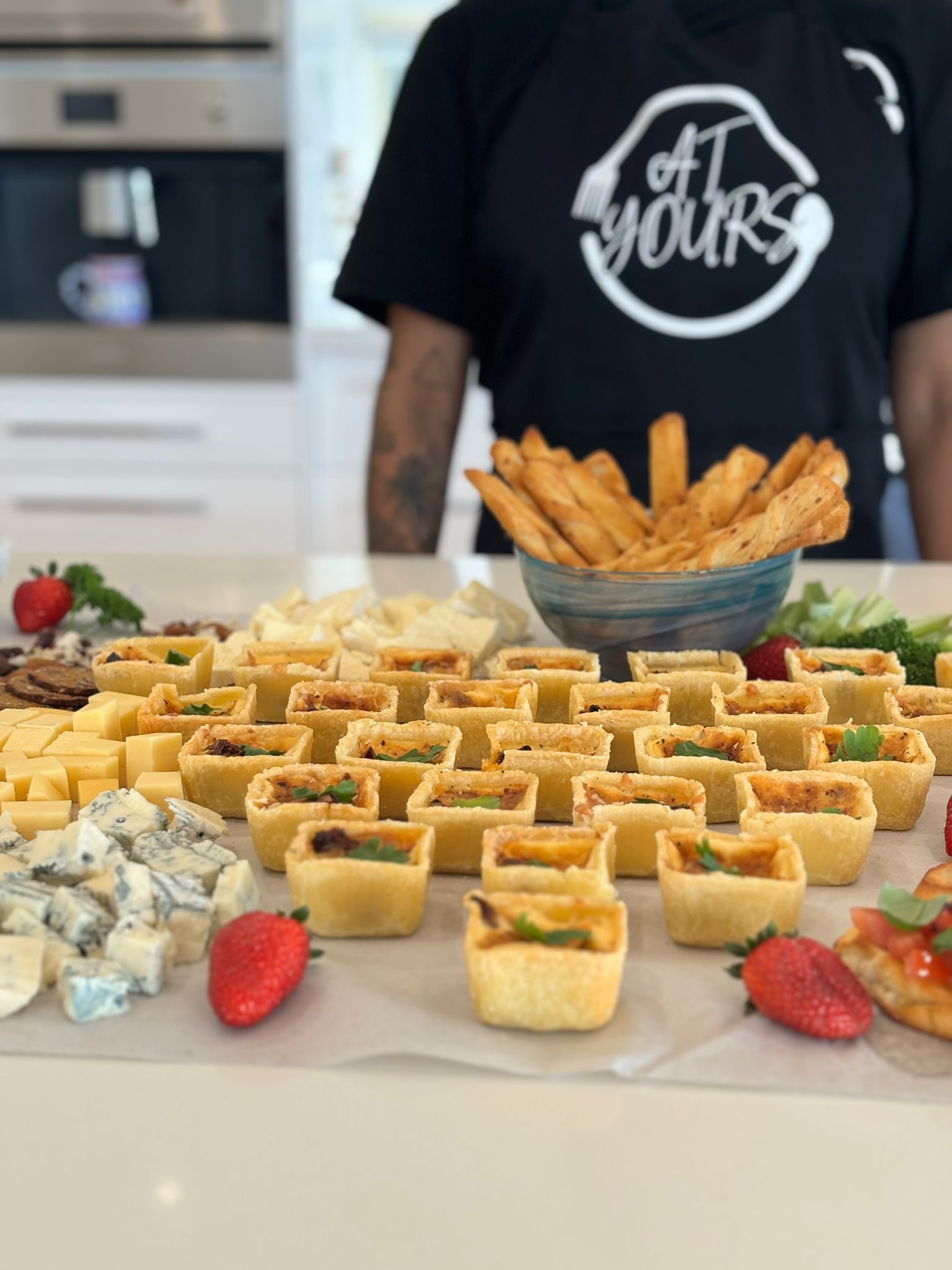 Catering staff with a selection of elegant canapés